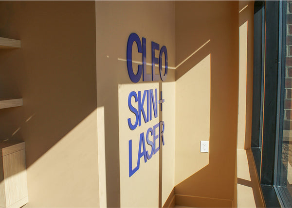 The interior CLEO Skin + Laser sign of the Birmingham location.
