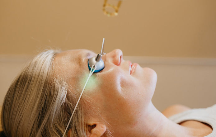 Woman receiving the Glass Skin Laser Facial treatment