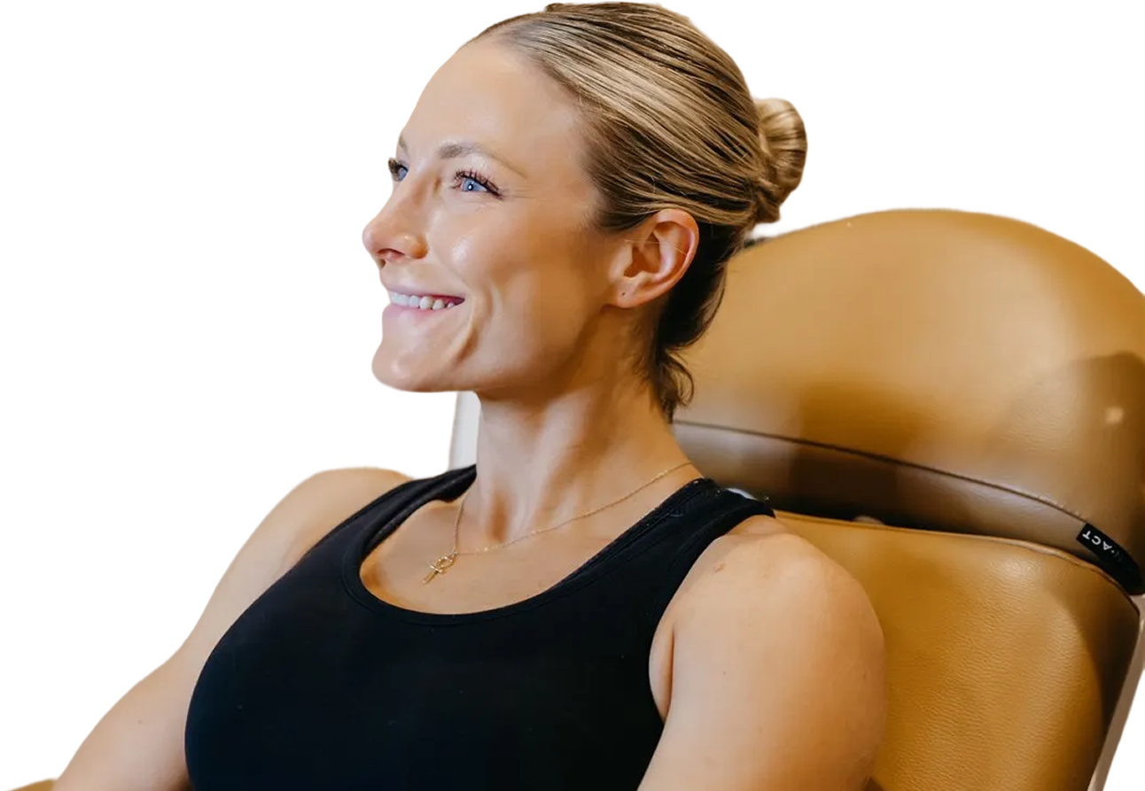 Woman sitting in comfortable chair and smiling
