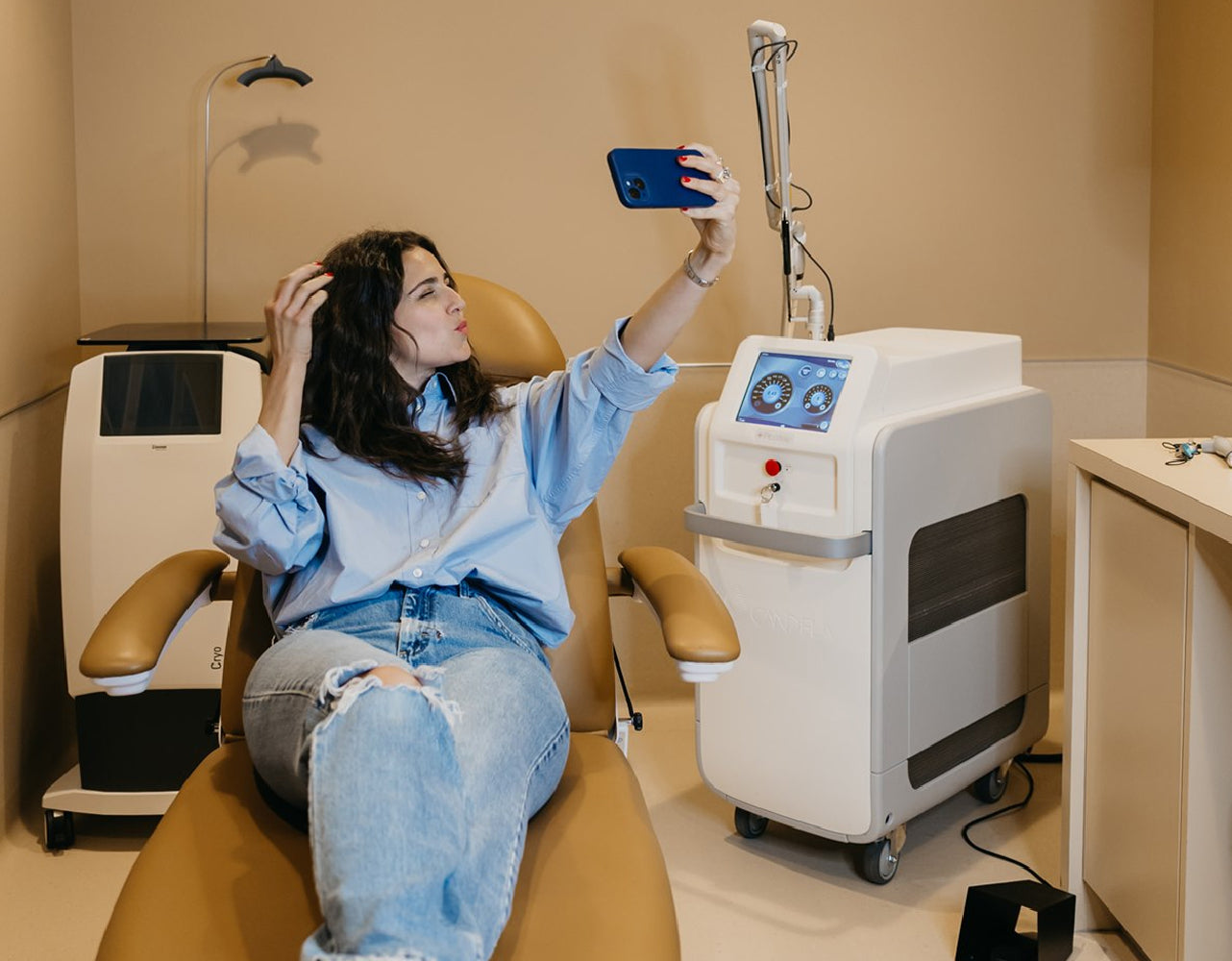 Cleo client taking selfie while in treatment chair