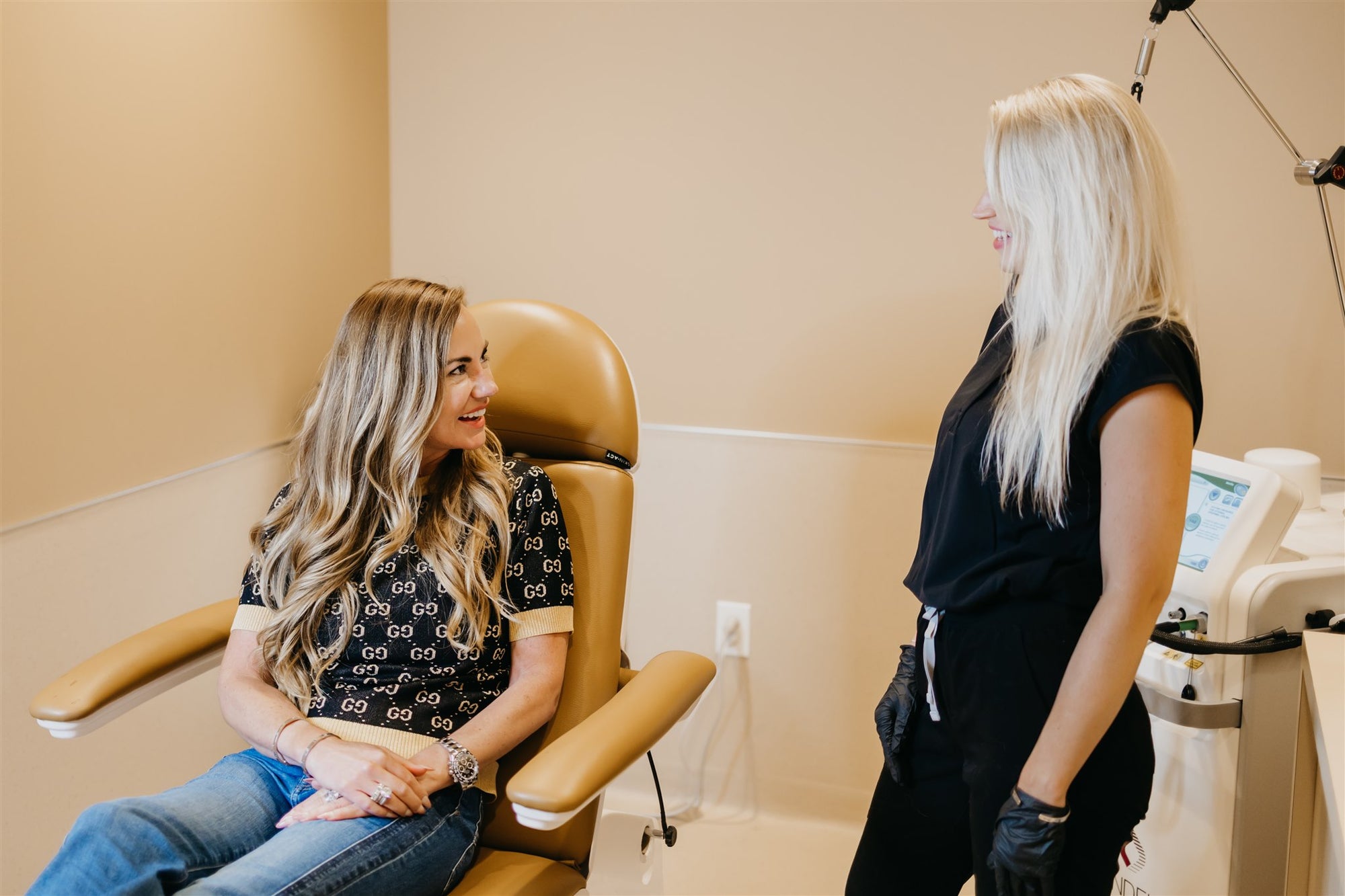 Cleo provider discussing treatment with woman