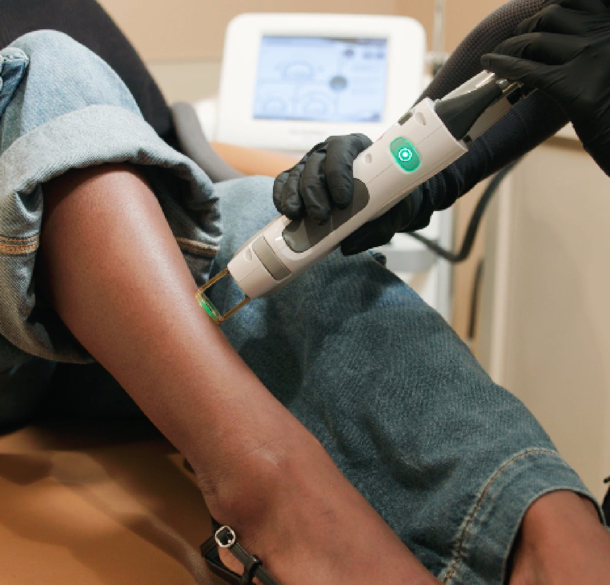Laser treatment applied to shin.